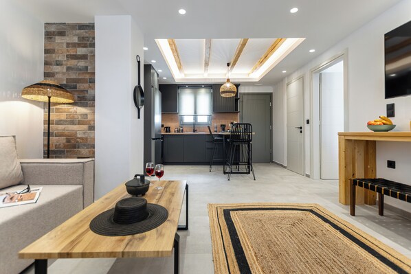 Suite Deluxe | Área de sala de estar