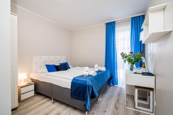 1 bedroom, desk, iron/ironing board, travel cot