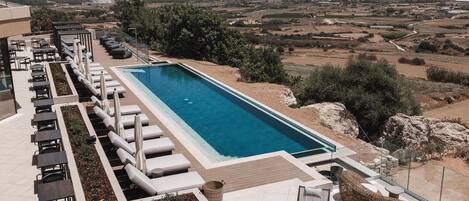 Indoor pool, outdoor pool, pool umbrellas, sun loungers