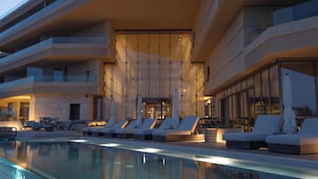 Indoor pool, outdoor pool, pool umbrellas, sun loungers