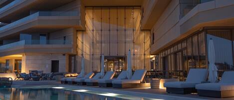 Indoor pool, outdoor pool, pool umbrellas, sun loungers