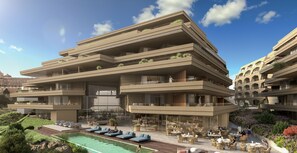 Indoor pool, outdoor pool, pool umbrellas, pool loungers