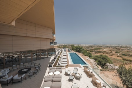 Indoor pool, outdoor pool, pool umbrellas, sun loungers