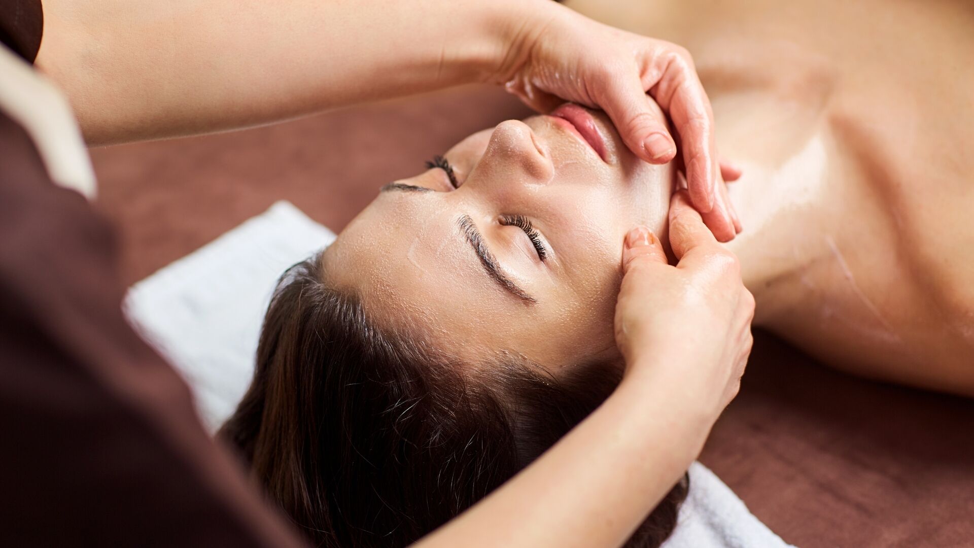 A person receiving a facial treatment.
