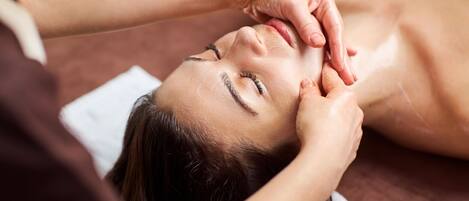 A person receiving a facial treatment.