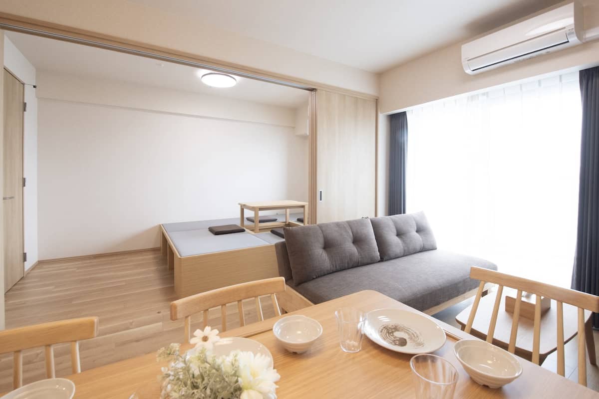 Apartment with 2 Beds (Maximum 4 people) - 6th-9th Floor Etype | Living room | 50-inch flat-screen TV with digital channels