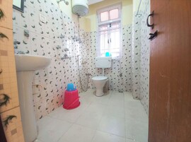 Designer toiletries, slippers, towels, soap