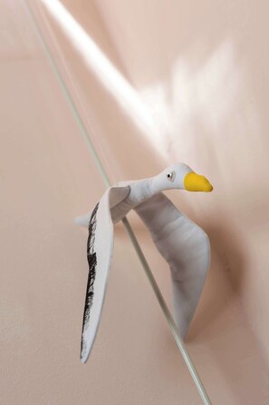 A swan-shaped decoration on a glass surface. - Apartment Dei Fiori 2 (Rovinj)