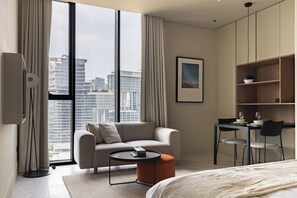 Comfort Studio, Non Smoking | Living area | 45-inch Smart TV with digital channels, Netflix, streaming services - SIMPLY COMFORT Upside Living Business Bay Stunning Panoramic Burj Cityline Views (Dubai)