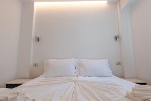 Apartamento luxo | Escrivaninha, quartos à prova de som, Wi-Fi de cortesia, roupa de cama