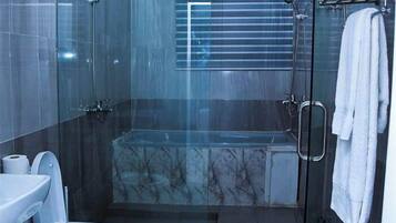 Shower, hair dryer, towels, soap