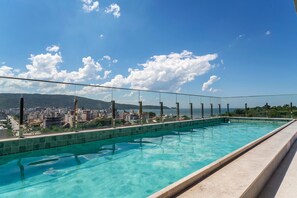 Indoor pool, outdoor pool, open 6:00 AM to noon, pool umbrellas