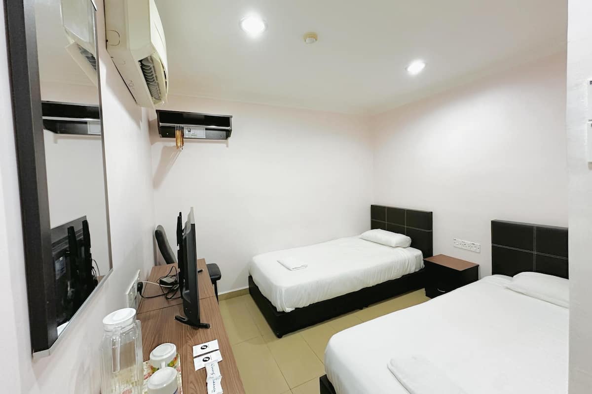 Habitación estándar con 2 camas individuales | Wifi gratis y ropa de cama