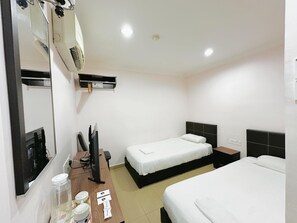 Habitación estándar con 2 camas individuales | Wifi gratis y ropa de cama