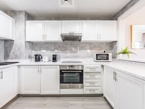 Fridge, microwave, oven, coffee/tea maker