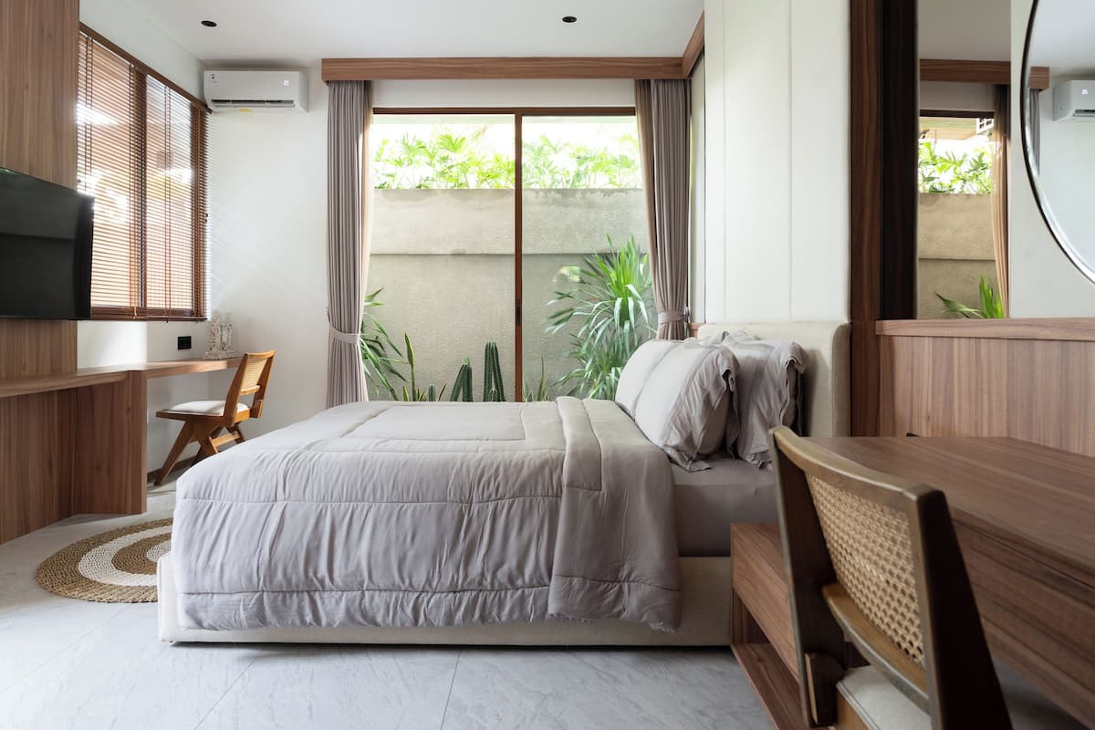 Premium bedding, blackout drapes, soundproofing, iron/ironing board