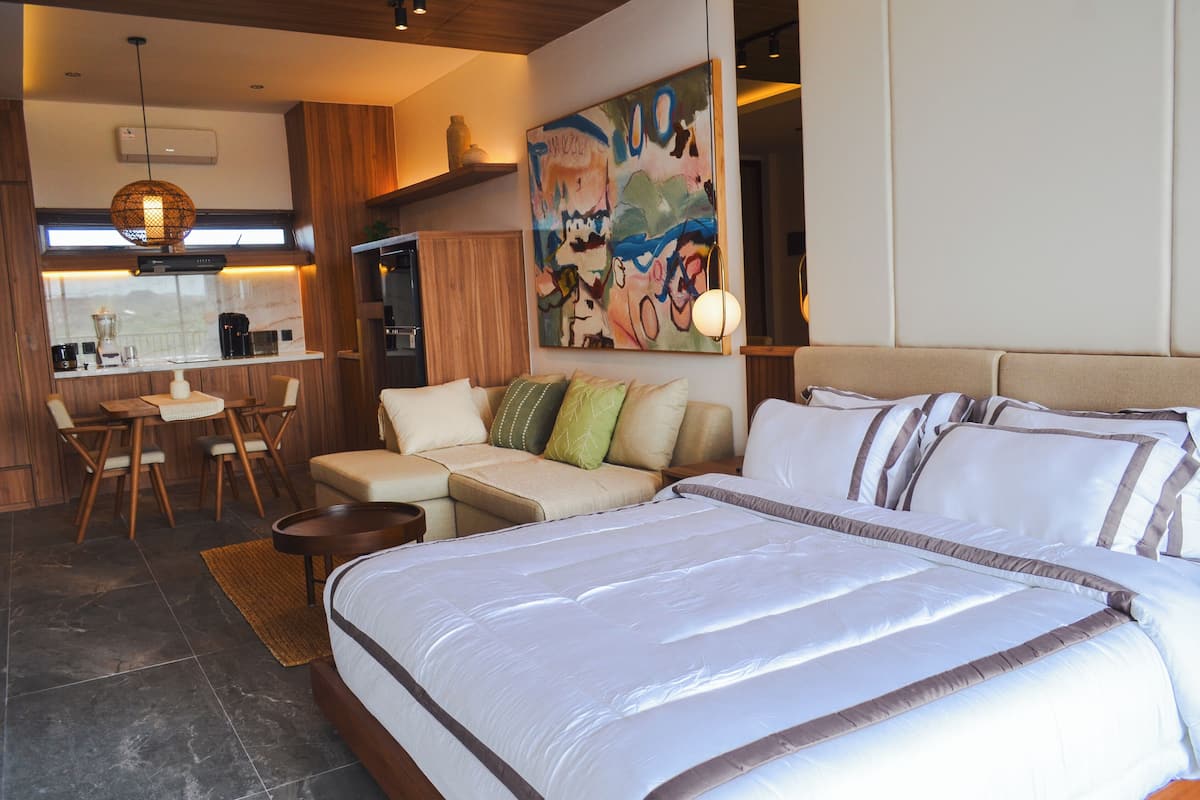 Premium bedding, blackout drapes, soundproofing, iron/ironing board