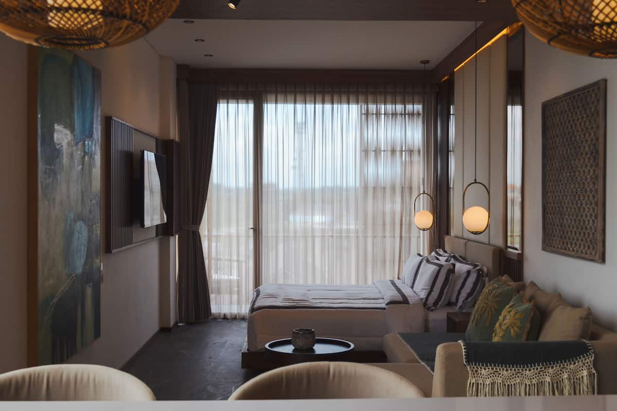 Premium bedding, blackout drapes, soundproofing, iron/ironing board