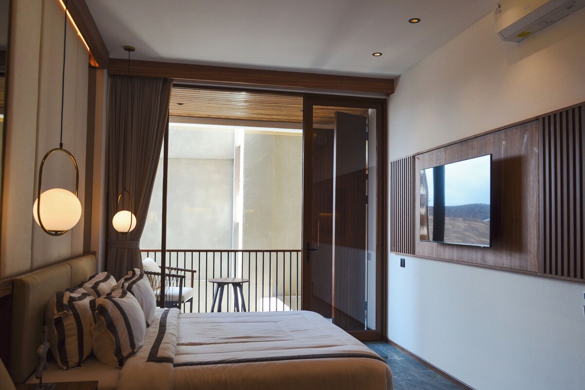 Premium bedding, blackout drapes, soundproofing, iron/ironing board