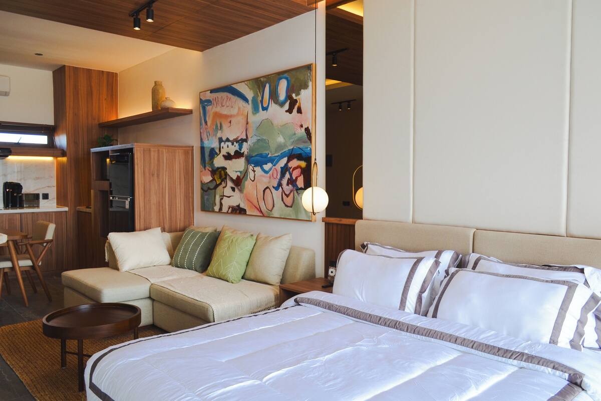 Premium bedding, blackout drapes, soundproofing, iron/ironing board