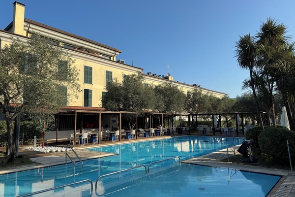 Seasonal outdoor pool, open 10:00 AM to 6:00 PM, pool umbrellas