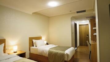 Comfort Twin Room, Courtyard View | In-room safe, desk, laptop workspace, free WiFi