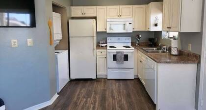 2 minute walk to the beach ~ 2 pools and a balcony-Sleeps 4