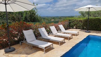 Seasonal outdoor pool, pool umbrellas, sun loungers