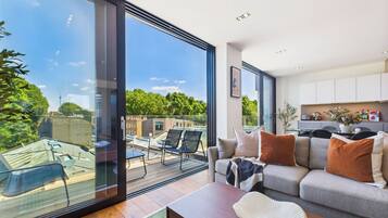 Signature Apartment, 2 Bedrooms, Balcony | Individually decorated, individually furnished, desk, laptop workspace