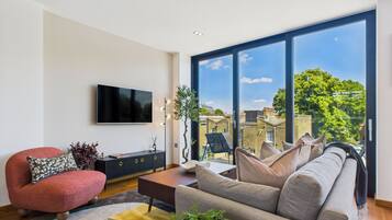 Signature Apartment, 2 Bedrooms, Balcony | Individually decorated, individually furnished, desk, laptop workspace