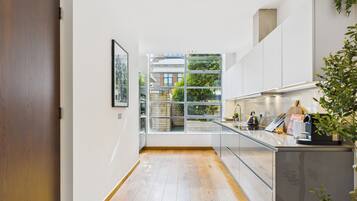 Standard Apartment | Individually decorated, individually furnished, desk, laptop workspace