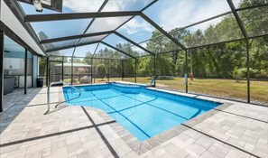 A heated pool - Cozy home with heated pool in Brooksville, FL (Spring Hill)