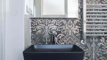 Suite, Balcony, City View | Bathroom | Shower, free toiletries, hair dryer, towels