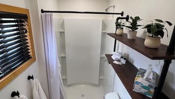 Shower, hair dryer, towels, soap