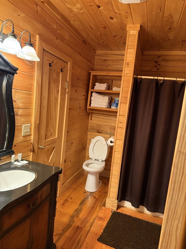 Shower, towels, soap, shampoo