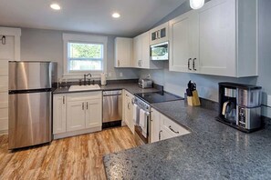 Fridge, microwave, oven, stovetop - Heart of Old St. Augustine — Charm, Comfort, Hot Tub Oasis (St. Augustine)