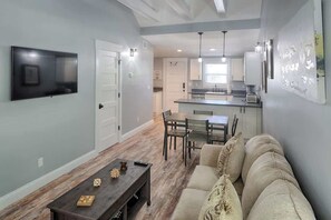 Living area - Charming St. Augustine cottages + resort-style outdoor area + walk to downtown. (St. Augustine)