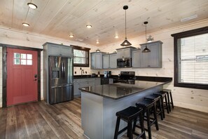 Dishwasher, cookware/dishes/utensils, paper towels, dining tables - Creekside Paradise: Hot Tub,Arcade Games,NEAR PF! (Pigeon Forge)