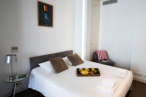 1 bedroom, desk, iron/ironing board, travel crib