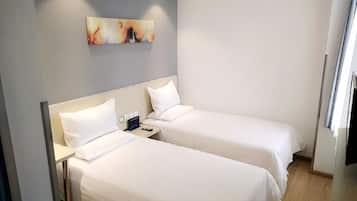Desk, blackout drapes, bed sheets