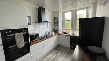 Apartment | Private kitchen | Fridge, microwave, oven, stovetop