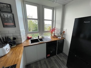 Fridge, microwave, oven, stovetop - Isle of Bute Blissful Retreat- Stunning 3 Bed Flat (Rothesay)