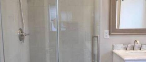 Hair dryer, towels, soap, shampoo