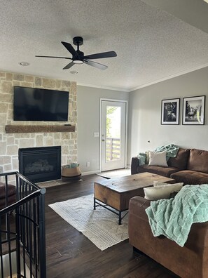 Smart TV, fireplace, foosball, table tennis