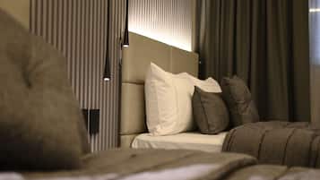 Habitación Deluxe doble | Caja fuerte y ropa de cama