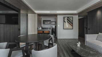 Suite superior | Área de sala de estar