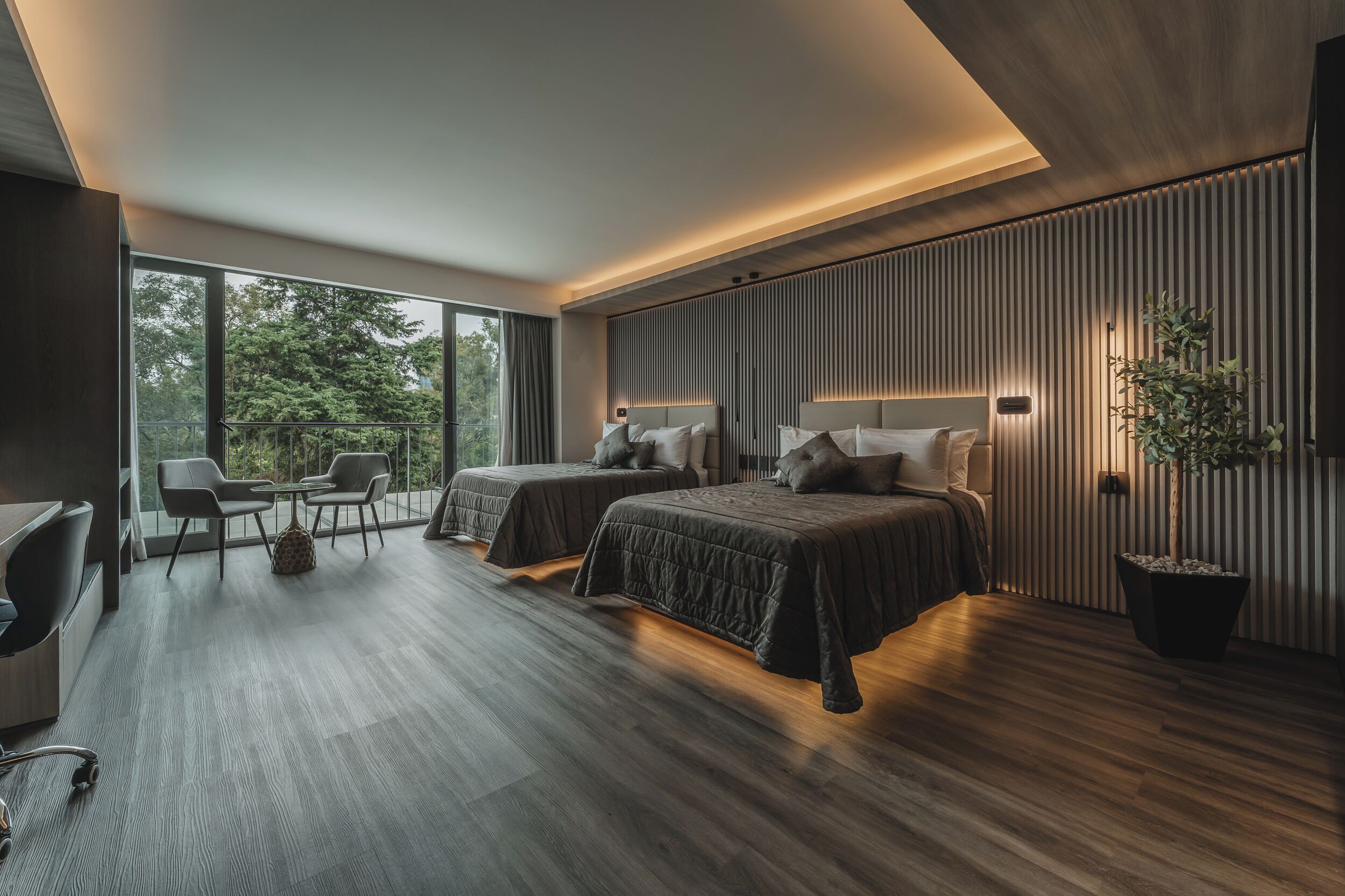 Habitación Deluxe doble | Caja fuerte y ropa de cama