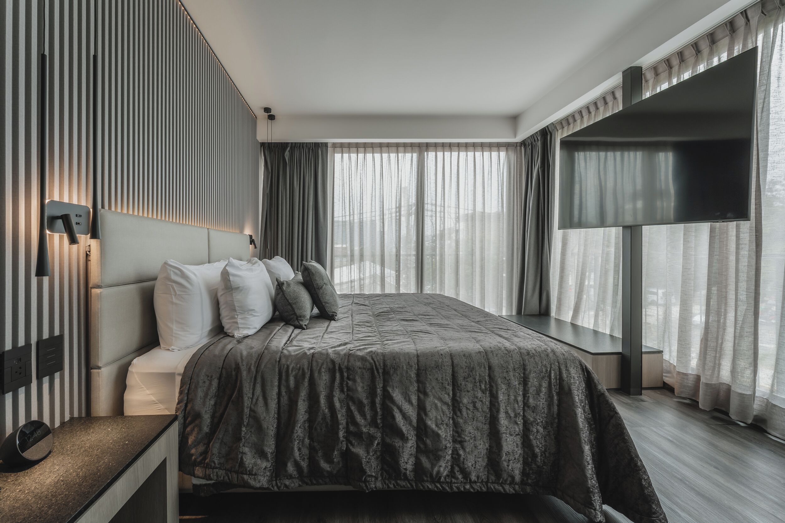 Suite superior | Caja fuerte y ropa de cama