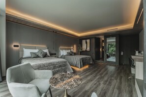 Habitación Deluxe doble | Caja fuerte y ropa de cama