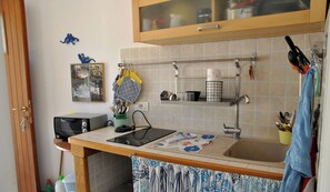 Fridge, stovetop, cookware/dishes/utensils